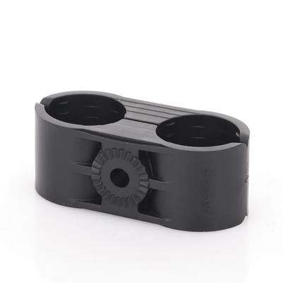 CB-114 - Syscom Towers Sujetador Plástico para Cable Coaxial / 2 Cables / 1-1/4" Nominal CB-114